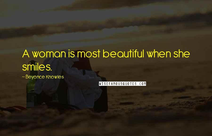 Beyonce Knowles Quotes: A woman is most beautiful when she smiles.