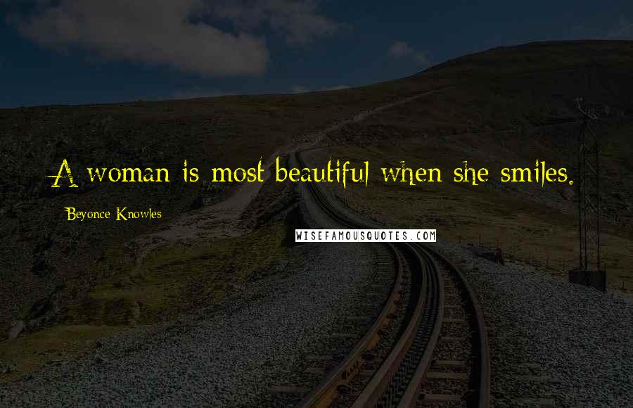 Beyonce Knowles Quotes: A woman is most beautiful when she smiles.