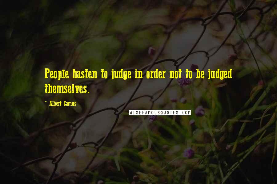 Albert Camus Quotes: People hasten to judge in order not to be judged themselves.