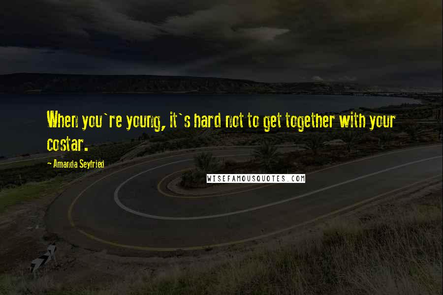 Amanda Seyfried Quotes: When you're young, it's hard not to get together with your costar.