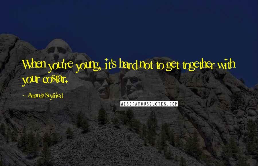 Amanda Seyfried Quotes: When you're young, it's hard not to get together with your costar.