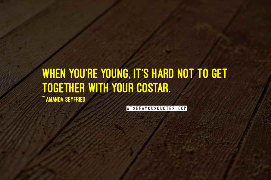 Amanda Seyfried Quotes: When you're young, it's hard not to get together with your costar.