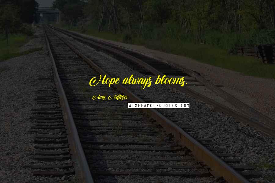 Amy Neftzger Quotes: Hope always blooms.