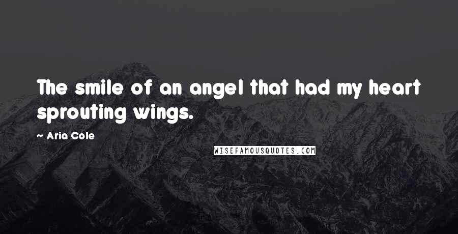 Aria Cole Quotes: The smile of an angel that had my heart sprouting wings.