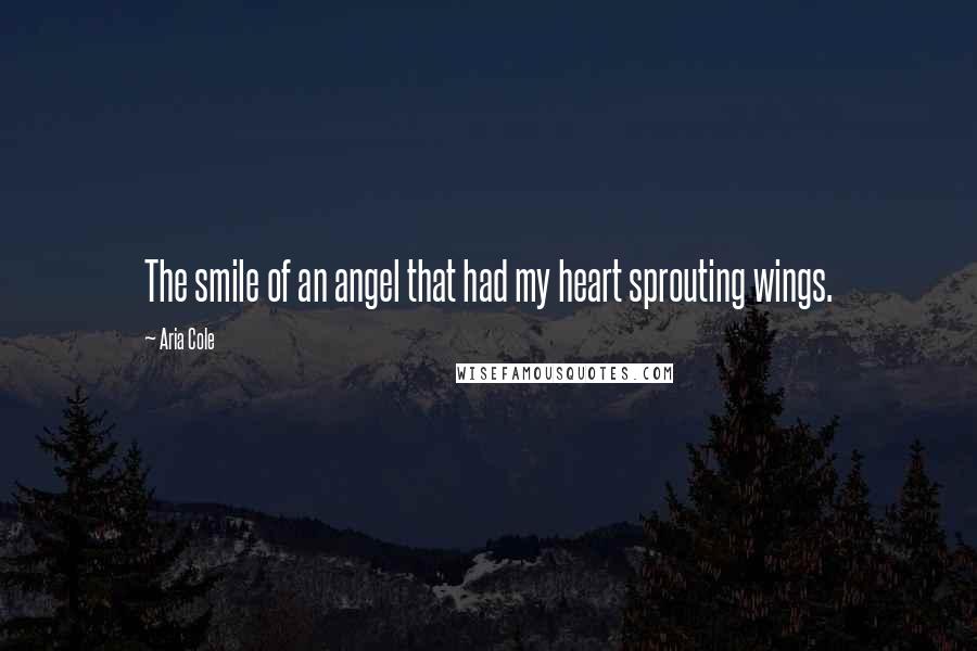 Aria Cole Quotes: The smile of an angel that had my heart sprouting wings.