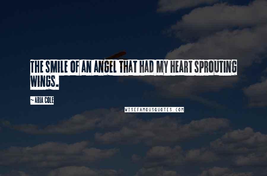 Aria Cole Quotes: The smile of an angel that had my heart sprouting wings.