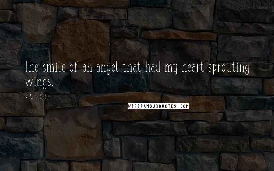 Aria Cole Quotes: The smile of an angel that had my heart sprouting wings.