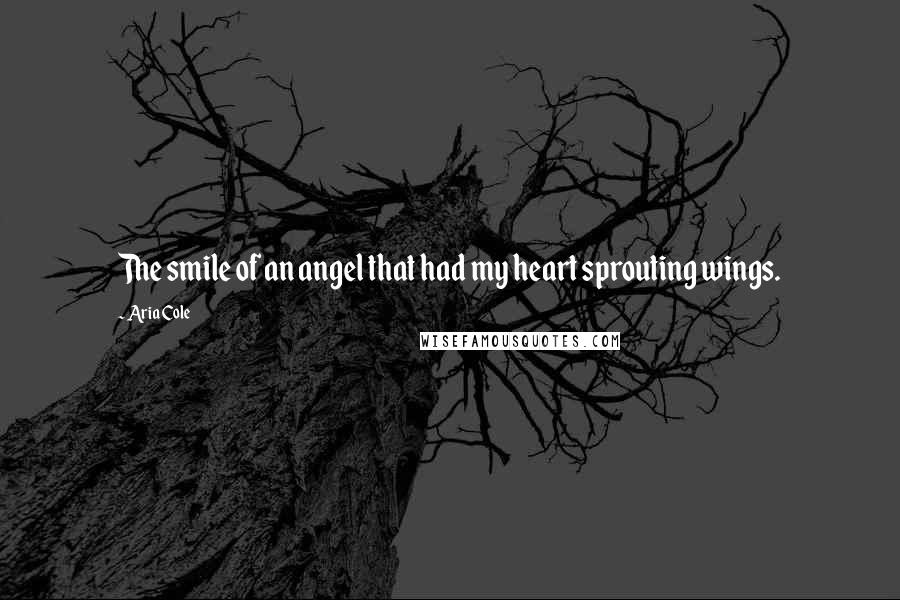 Aria Cole Quotes: The smile of an angel that had my heart sprouting wings.