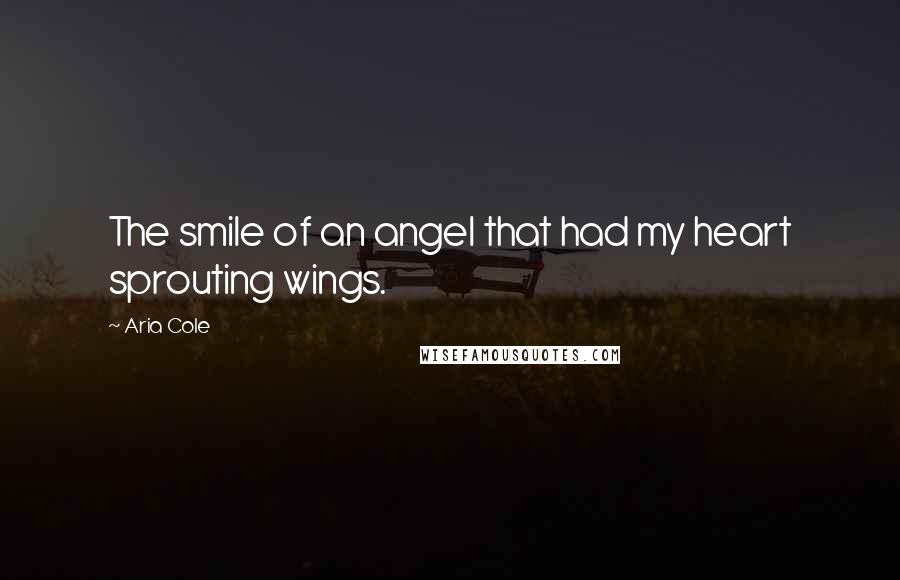Aria Cole Quotes: The smile of an angel that had my heart sprouting wings.