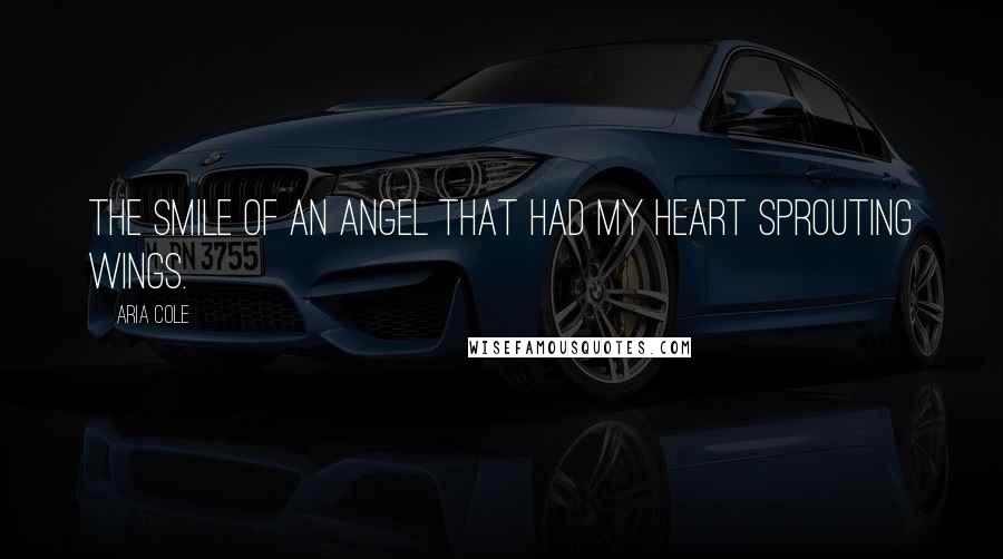 Aria Cole Quotes: The smile of an angel that had my heart sprouting wings.