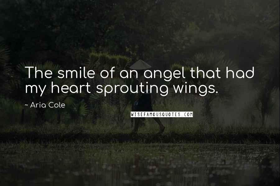 Aria Cole Quotes: The smile of an angel that had my heart sprouting wings.