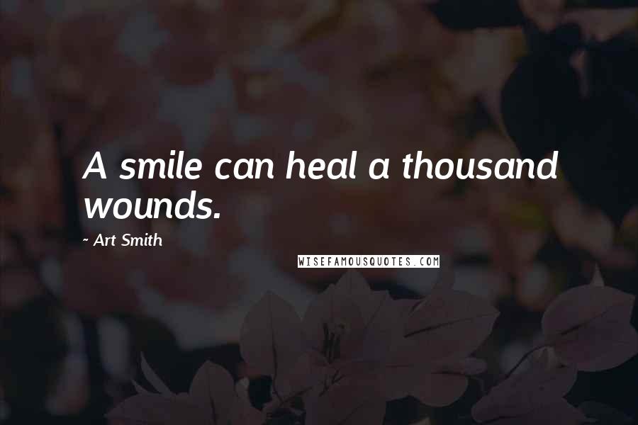 Art Smith Quotes: A smile can heal a thousand wounds.