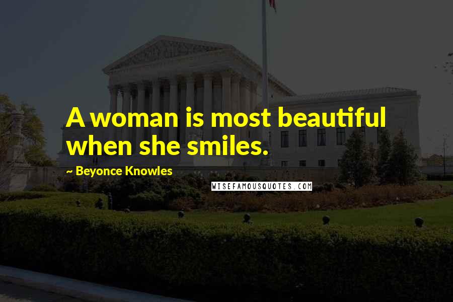 Beyonce Knowles Quotes: A woman is most beautiful when she smiles.