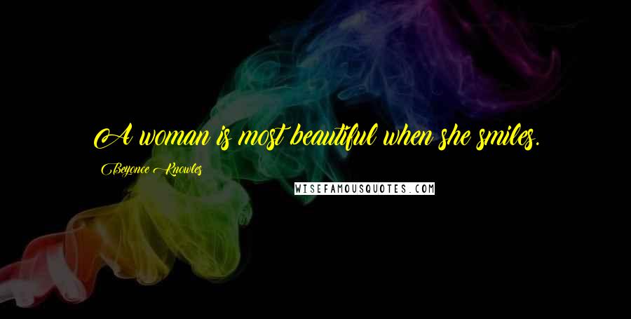 Beyonce Knowles Quotes: A woman is most beautiful when she smiles.