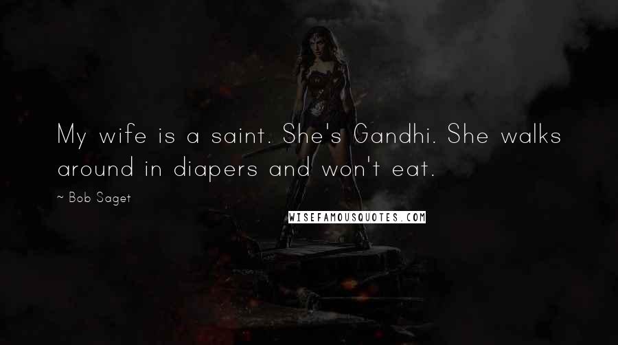 Bob Saget Quotes: My wife is a saint. She's Gandhi. She walks around in diapers and won't eat.