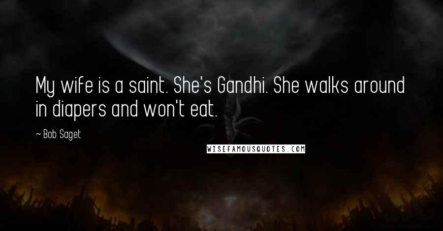 Bob Saget Quotes: My wife is a saint. She's Gandhi. She walks around in diapers and won't eat.