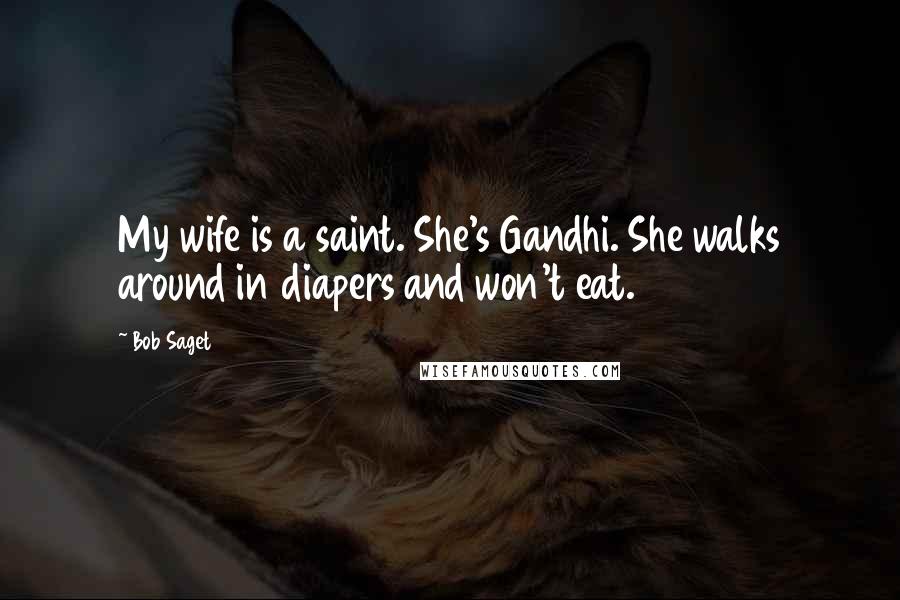 Bob Saget Quotes: My wife is a saint. She's Gandhi. She walks around in diapers and won't eat.