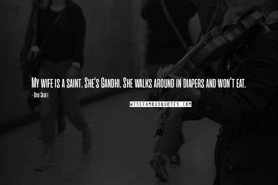 Bob Saget Quotes: My wife is a saint. She's Gandhi. She walks around in diapers and won't eat.