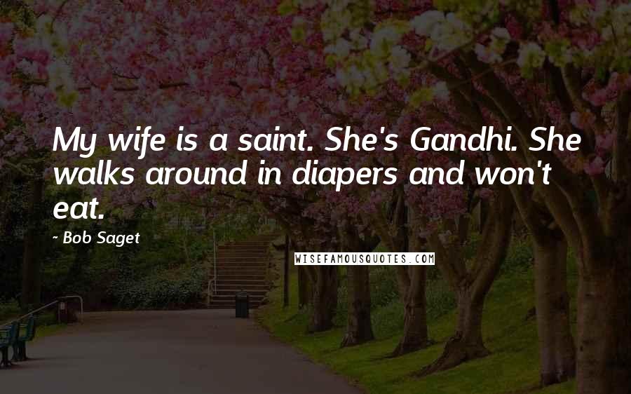 Bob Saget Quotes: My wife is a saint. She's Gandhi. She walks around in diapers and won't eat.