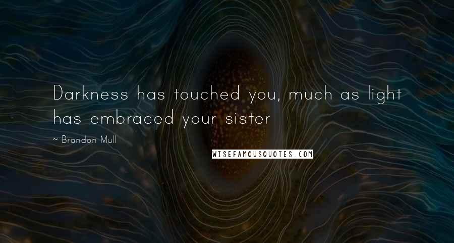 Brandon Mull Quotes: Darkness has touched you, much as light has embraced your sister