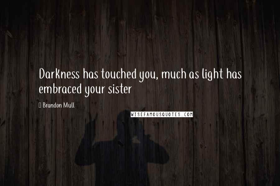 Brandon Mull Quotes: Darkness has touched you, much as light has embraced your sister