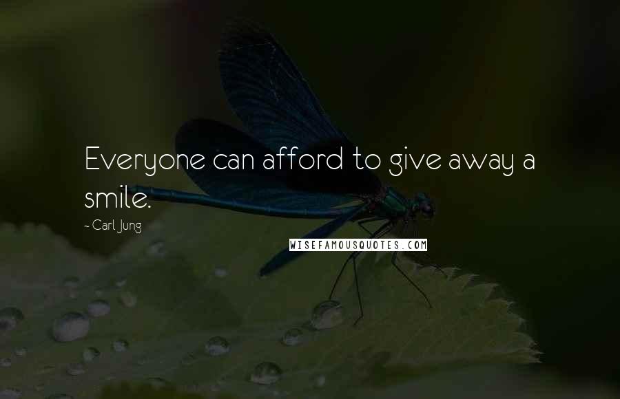 Carl Jung Quotes: Everyone can afford to give away a smile.