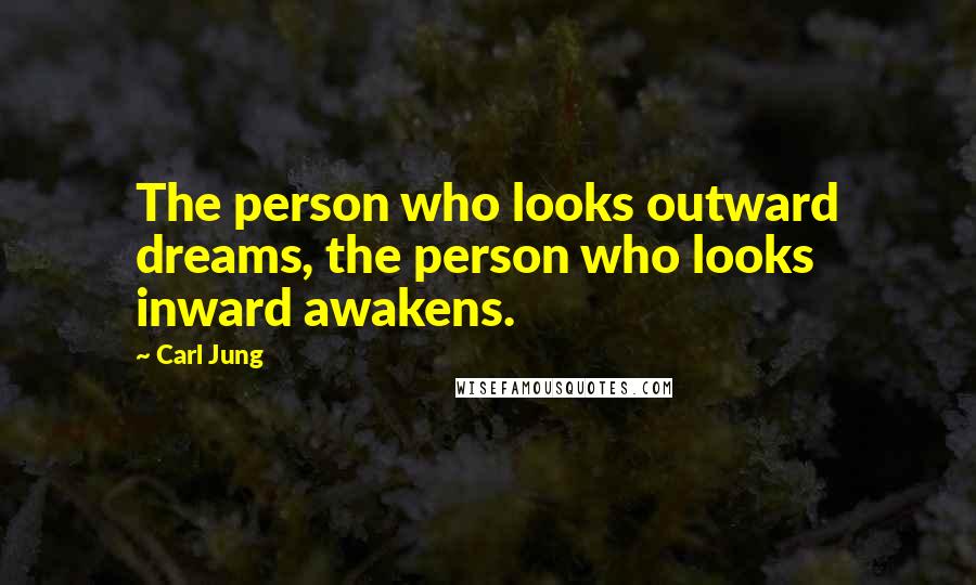 Carl Jung Quotes: The person who looks outward dreams, the person who looks inward awakens.