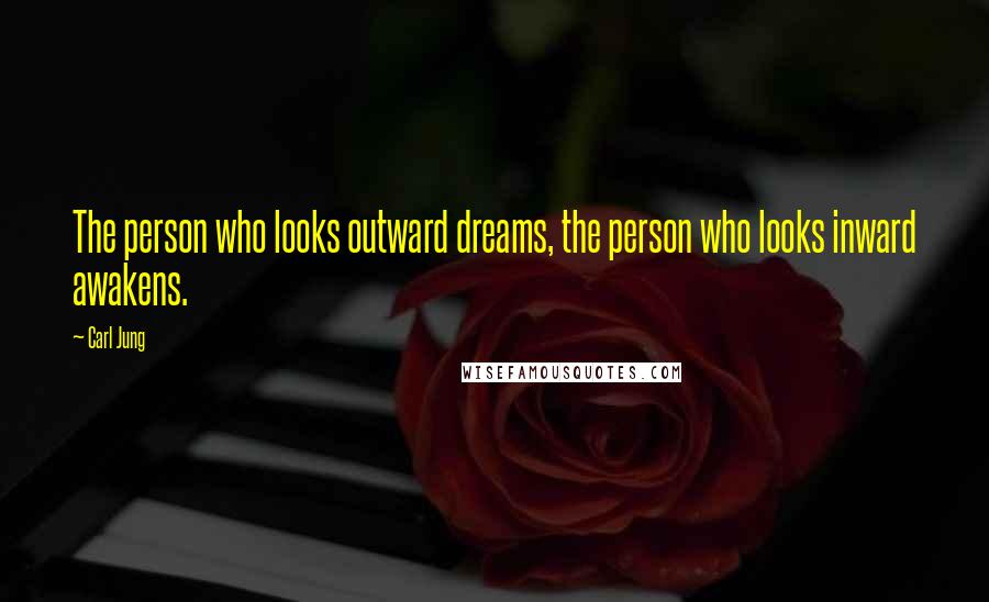 Carl Jung Quotes: The person who looks outward dreams, the person who looks inward awakens.