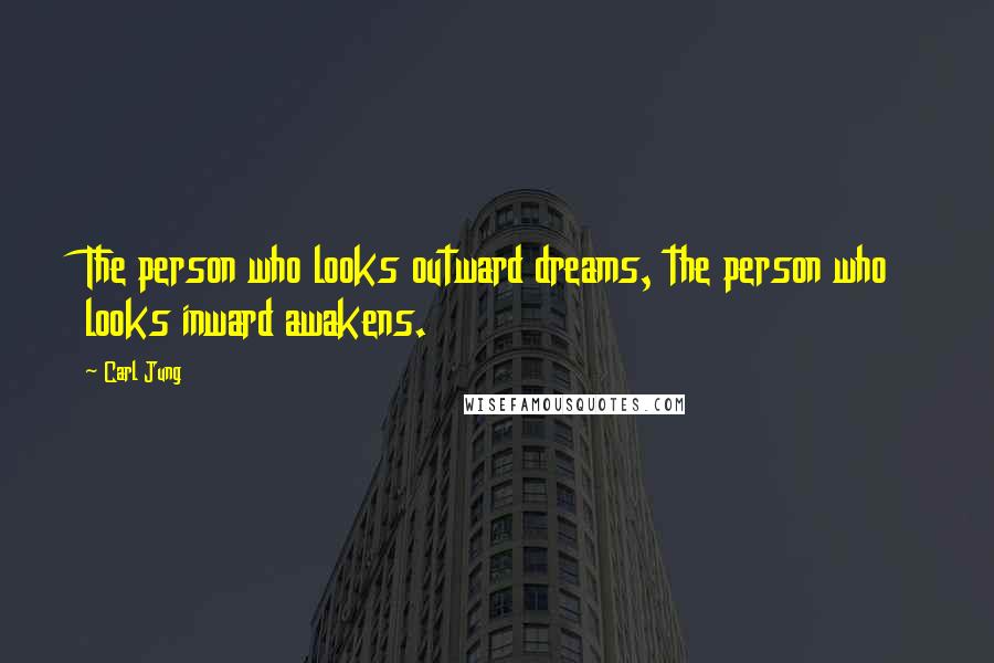 Carl Jung Quotes: The person who looks outward dreams, the person who looks inward awakens.