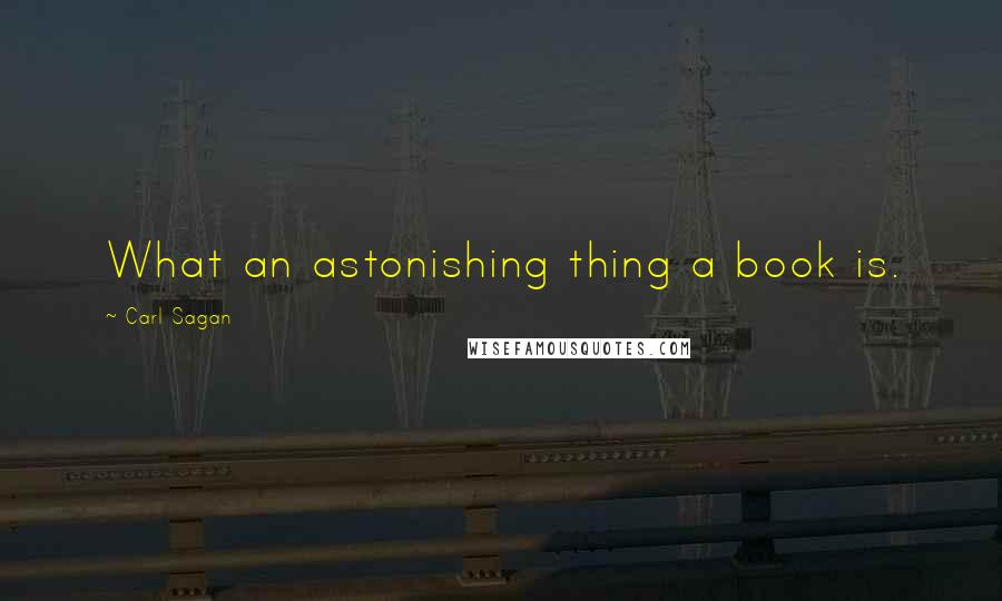 Carl Sagan Quotes: What an astonishing thing a book is.