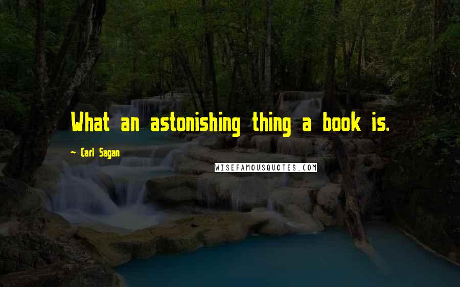 Carl Sagan Quotes: What an astonishing thing a book is.