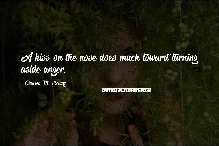 Charles M. Schulz Quotes: A kiss on the nose does much toward turning aside anger.