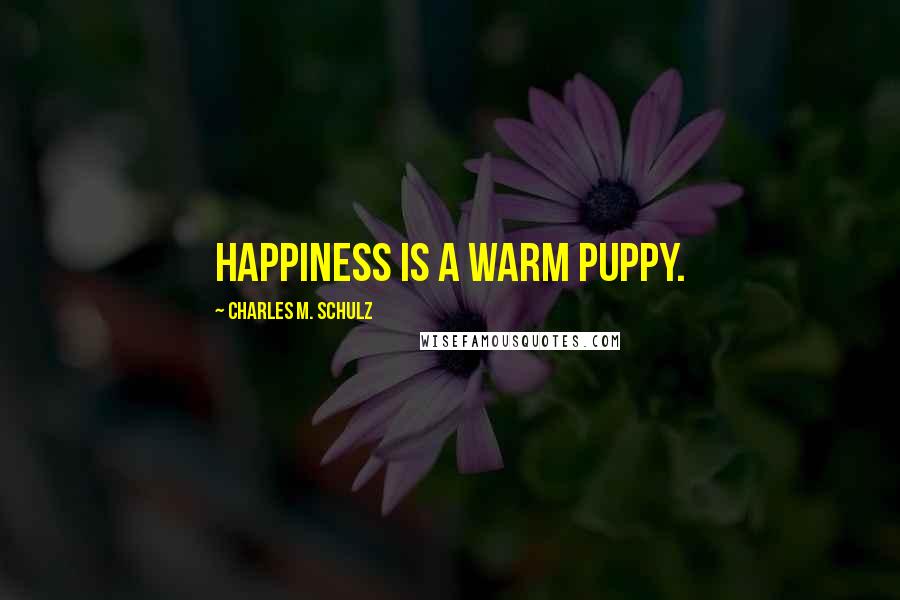 Charles M. Schulz Quotes: Happiness is a warm puppy.