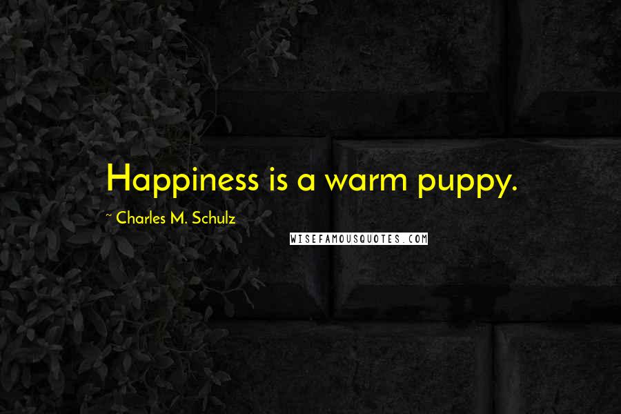 Charles M. Schulz Quotes: Happiness is a warm puppy.