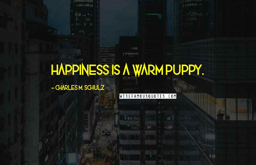 Charles M. Schulz Quotes: Happiness is a warm puppy.