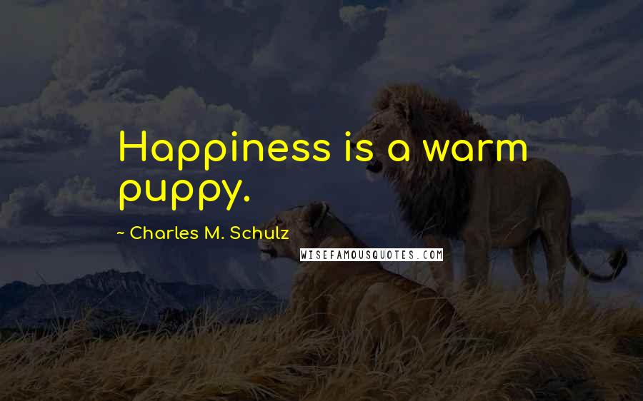 Charles M. Schulz Quotes: Happiness is a warm puppy.