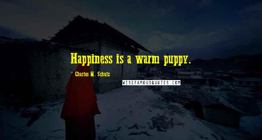 Charles M. Schulz Quotes: Happiness is a warm puppy.