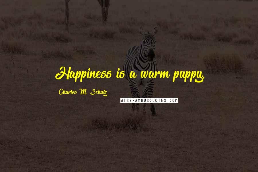 Charles M. Schulz Quotes: Happiness is a warm puppy.