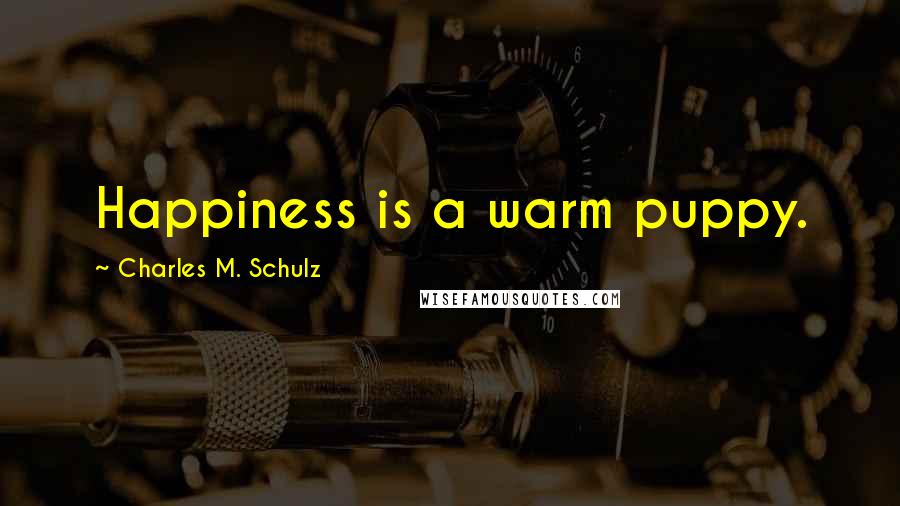 Charles M. Schulz Quotes: Happiness is a warm puppy.