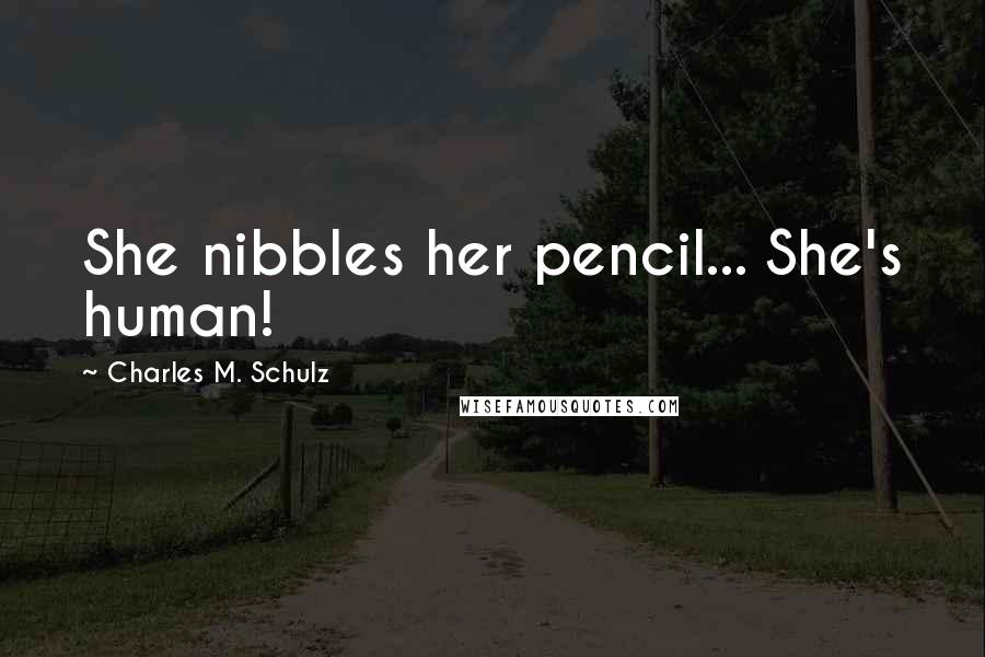 Charles M. Schulz Quotes: She nibbles her pencil... She's human!