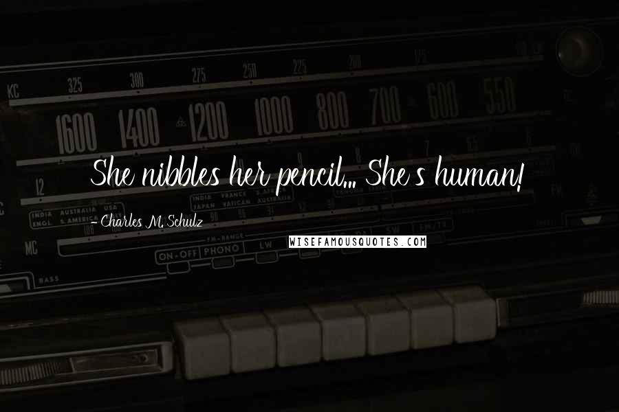 Charles M. Schulz Quotes: She nibbles her pencil... She's human!
