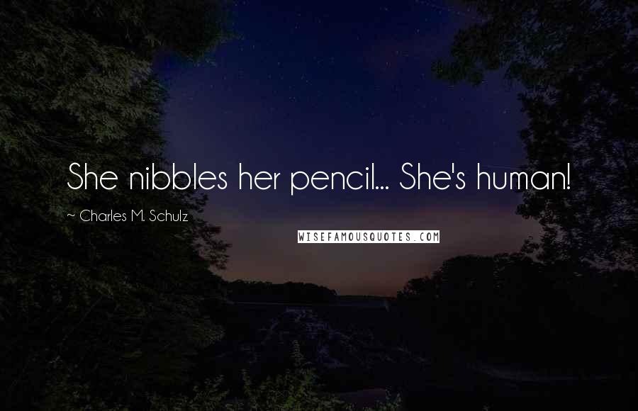 Charles M. Schulz Quotes: She nibbles her pencil... She's human!