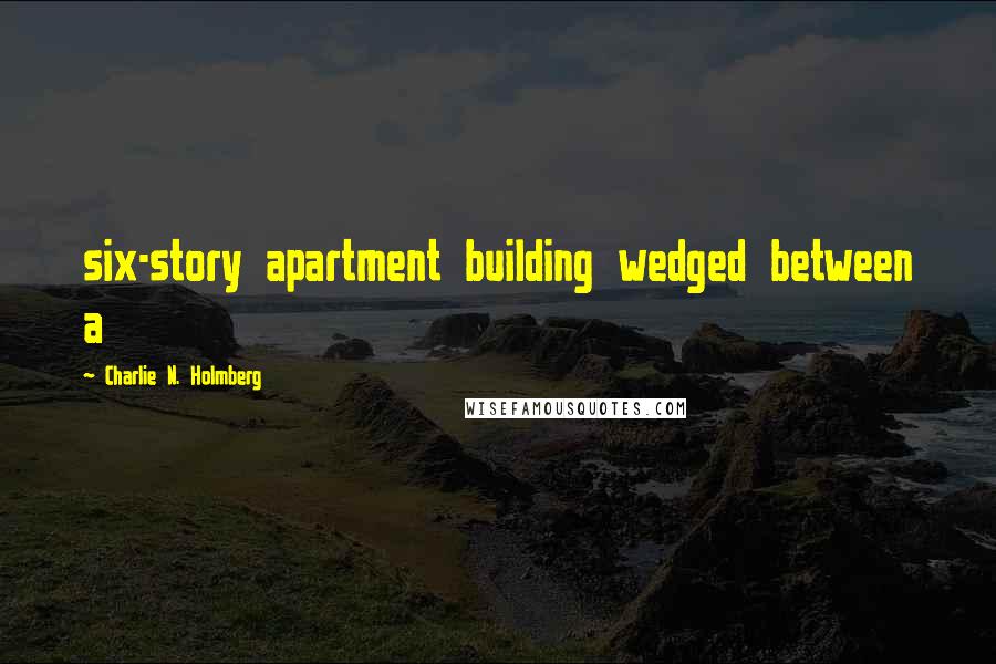 Charlie N. Holmberg Quotes: six-story apartment building wedged between a