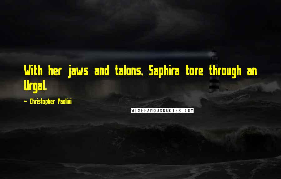 Christopher Paolini Quotes: With her jaws and talons, Saphira tore through an Urgal.