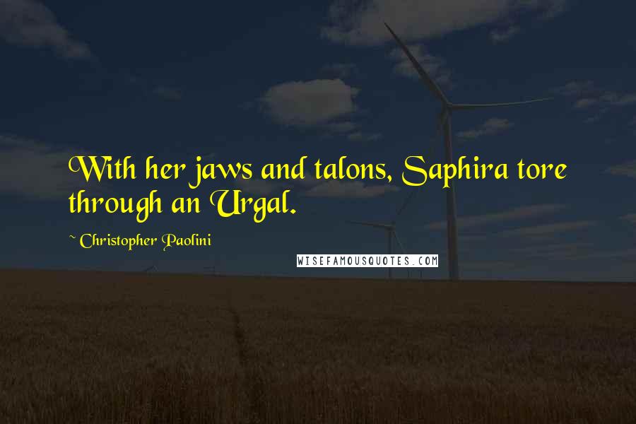 Christopher Paolini Quotes: With her jaws and talons, Saphira tore through an Urgal.