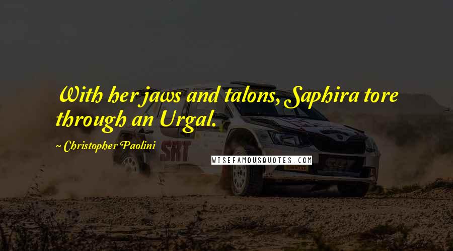 Christopher Paolini Quotes: With her jaws and talons, Saphira tore through an Urgal.