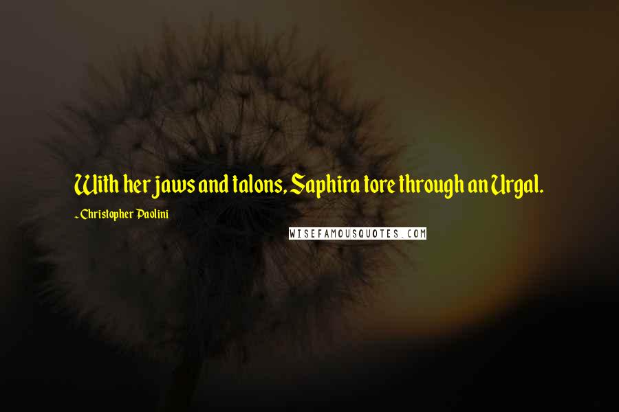 Christopher Paolini Quotes: With her jaws and talons, Saphira tore through an Urgal.