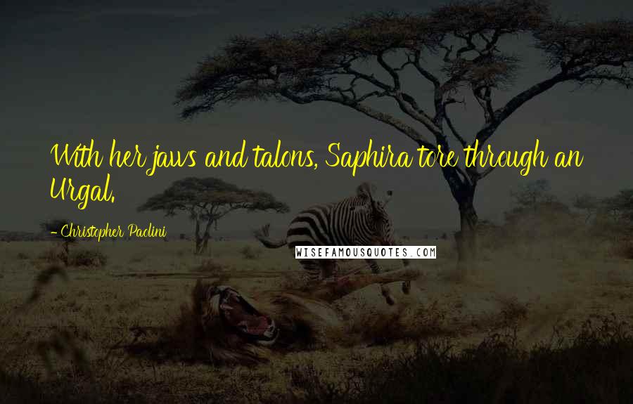 Christopher Paolini Quotes: With her jaws and talons, Saphira tore through an Urgal.