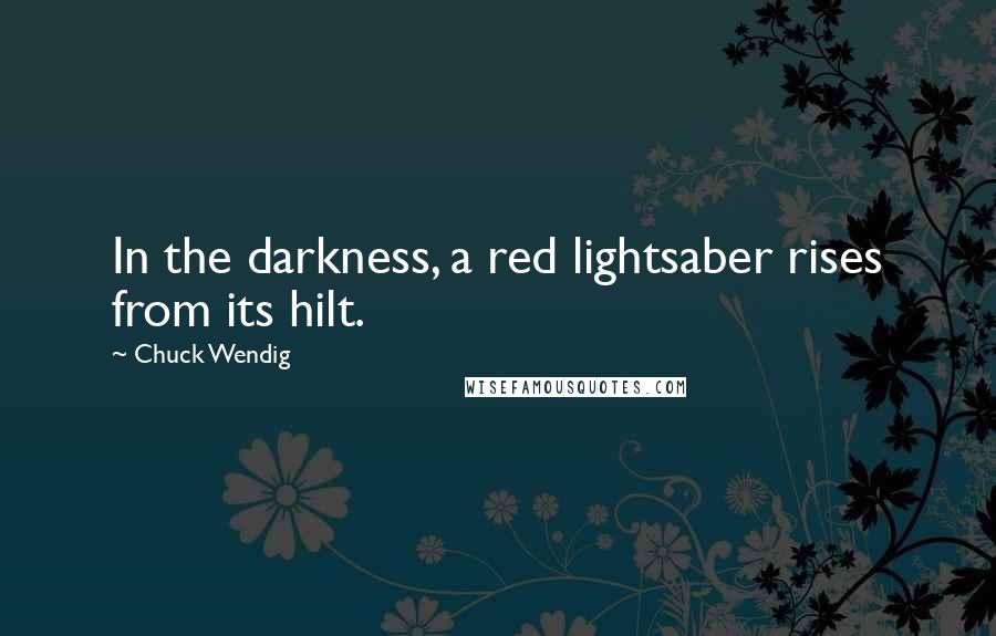 Chuck Wendig Quotes: In the darkness, a red lightsaber rises from its hilt.