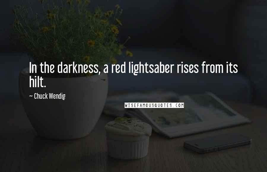 Chuck Wendig Quotes: In the darkness, a red lightsaber rises from its hilt.